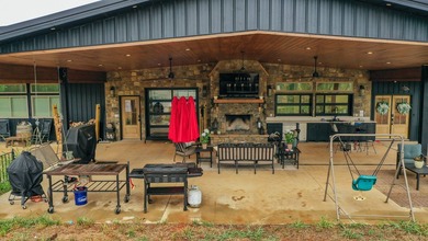 Still Mac Farm is a custom barndominium estate on 97 +/- acres - photo 8