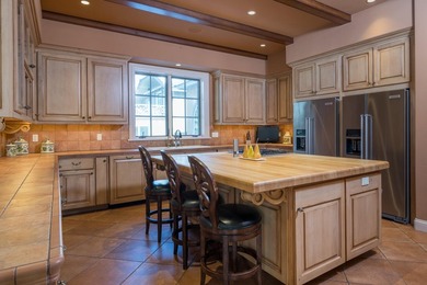 Set on over 5 acres of lushly landscaped grounds, the riverside - photo 14