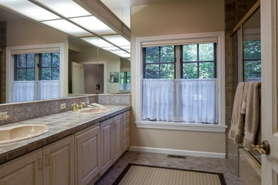 Set on over 5 acres of lushly landscaped grounds, the riverside - photo 24
