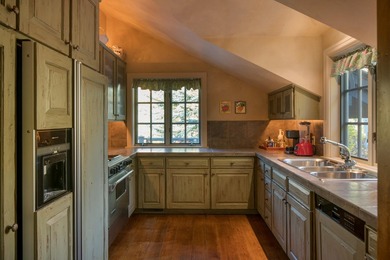 Set on over 5 acres of lushly landscaped grounds, the riverside - photo 28