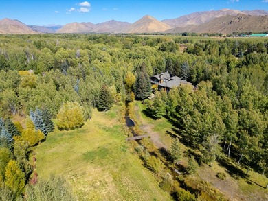 Set on over 5 acres of lushly landscaped grounds, the riverside - photo 35
