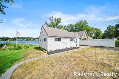 Lake Home For Sale in Conklin, Michigan