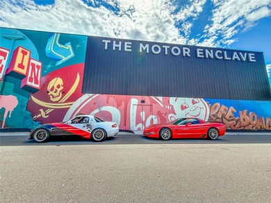 One or more photo(s) has been virtually staged. Motor Enclave - photo 10