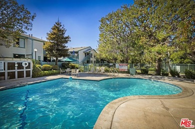 Ideally situated in Ponderosa West, this bright 1-bedroom - photo 24