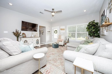 Tucked away in a charming coastal town, this 4-bedroom, 2-bath - photo 3
