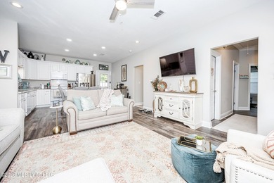Tucked away in a charming coastal town, this 4-bedroom, 2-bath - photo 7