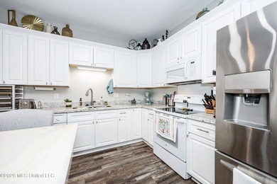 Tucked away in a charming coastal town, this 4-bedroom, 2-bath - photo 9