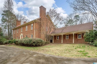 This full brick estate in Mountain Brook sitting on 2 acres can