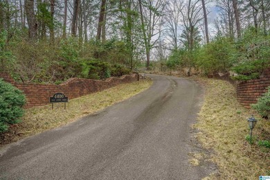 This full brick estate in Mountain Brook sitting on 2 acres can