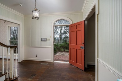 This full brick estate in Mountain Brook sitting on 2 acres can