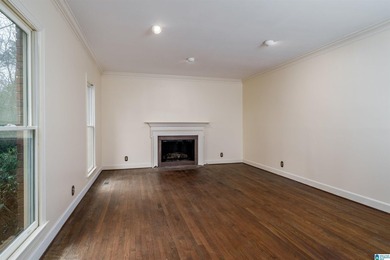 This full brick estate in Mountain Brook sitting on 2 acres can