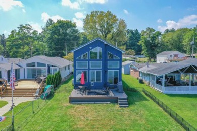 This brand-new three-bedroom, two-bath, 1320-square-foot home on - Lake Home Sale Pending in Edwardsburg, Michigan