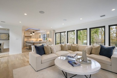 Sophisticated coastal living meets modern design in this new - photo 8