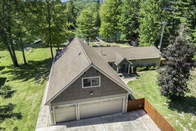 Lake Skegemog Home For Sale in Rapid City Michigan