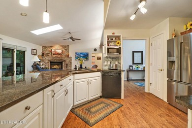 Step inside to an open floor plan featuring a spacious living - photo 11