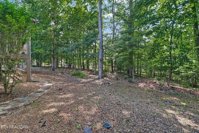 Step inside to an open floor plan featuring a spacious living - photo 16