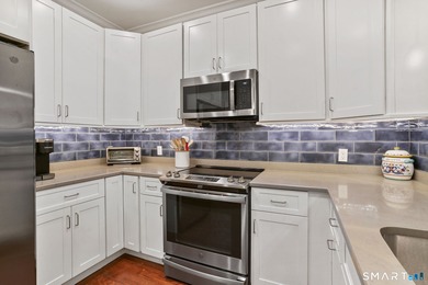 Enjoy effortless living in this beautifully appointed condo