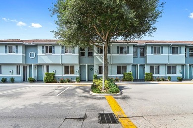 Welcome to this charming 3-bedroom, 2.5-bathroom townhouse - photo 1