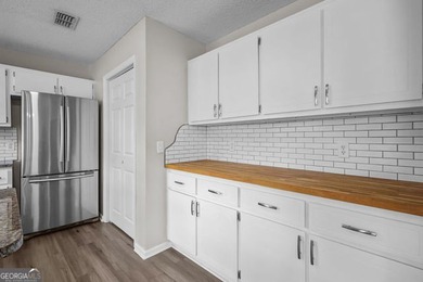 A beautifully updated 3 bedroom, 2 bath home located in the - photo 11