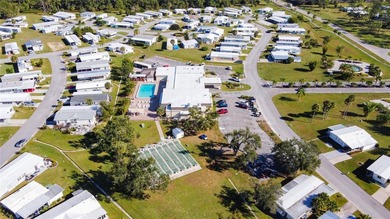 Welcome to Holiday Park, a beautiful 55+ manufactured home - photo 14