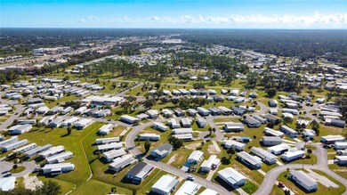Welcome to Holiday Park, a beautiful 55+ manufactured home - photo 15