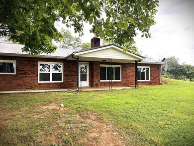 Tucked away on 5 fully fenced acres, this unique 3-bed, 2-bath - photo 5