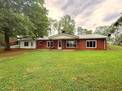 Tucked away on 5 fully fenced acres, this unique 3-bed, 2-bath - photo 6