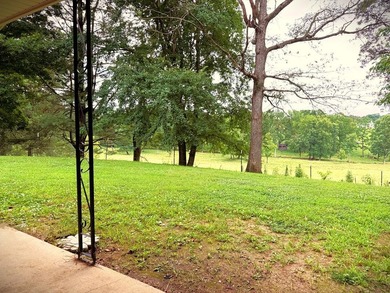 Tucked away on 5 fully fenced acres, this unique 3-bed, 2-bath - photo 9