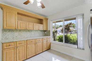 Welcome to this charming 3-bedroom, 2-bathroom villa situated in - photo 5