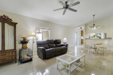 Welcome to this charming 3-bedroom, 2-bathroom villa situated in - photo 7