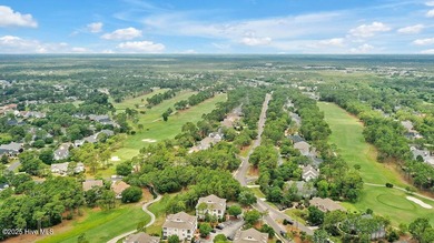Welcome HOME to the distinguished and privately gated coastal - photo 49