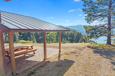 Perched above Lake Roosevelt on 10 private acres, this charming - photo 9