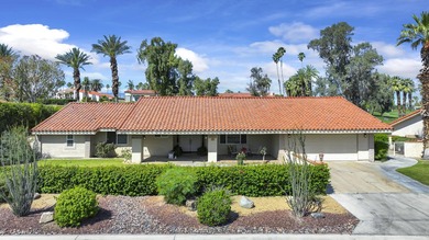 Custom home on a 12,197 square foot lot ON the golf course with - photo 2