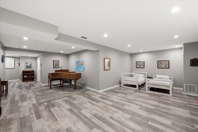 Backing to woods and featuring a screened porch and finished - photo 20