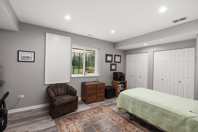 Backing to woods and featuring a screened porch and finished - photo 22
