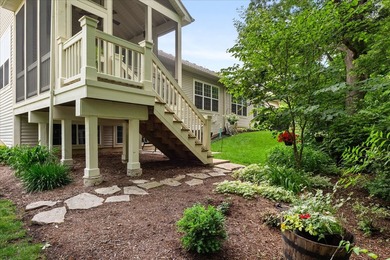 Backing to woods and featuring a screened porch and finished - photo 25