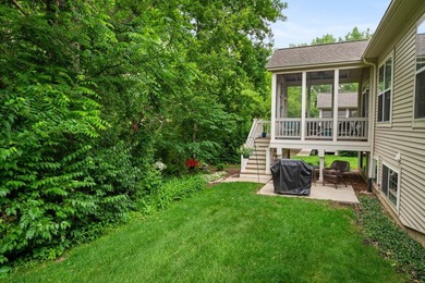Backing to woods and featuring a screened porch and finished - photo 26