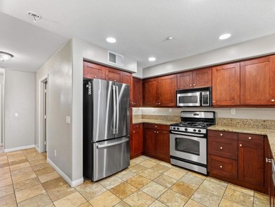 A beautifully maintained tri-level townhome located in the heart - photo 12