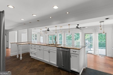 Nestled on a private wooded lot in the highly sought-after - photo 21