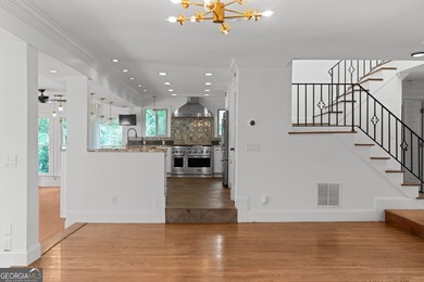 Nestled on a private wooded lot in the highly sought-after - photo 22