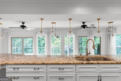 Nestled on a private wooded lot in the highly sought-after - photo 28