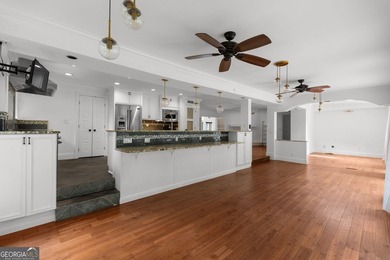 Nestled on a private wooded lot in the highly sought-after - photo 29
