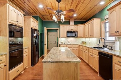 Lake Tenkiller living gets a serious upgrade with this stunning - photo 29