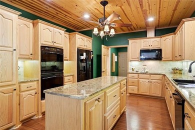 Lake Tenkiller living gets a serious upgrade with this stunning - photo 30