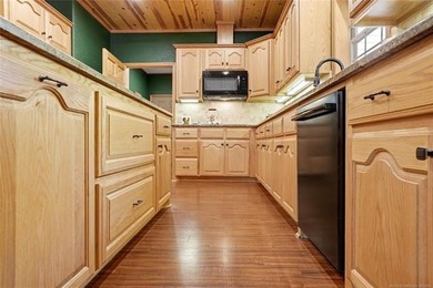 Lake Tenkiller living gets a serious upgrade with this stunning - photo 31