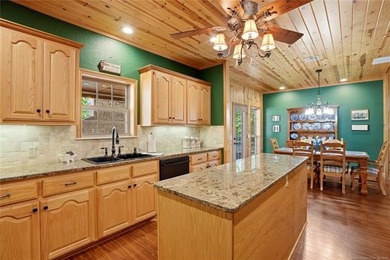 Lake Tenkiller living gets a serious upgrade with this stunning - photo 34