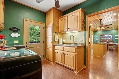 Lake Tenkiller living gets a serious upgrade with this stunning - photo 37