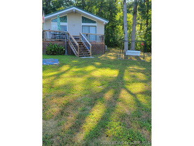 TWO HOMES & A LAKEFRONT LOT - Unique Investment Opportunity at - photo 42