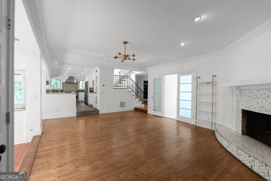 Nestled on a private wooded lot in the highly sought-after - photo 42
