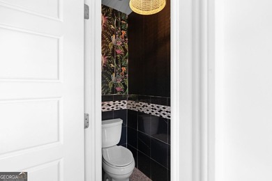 Nestled on a private wooded lot in the highly sought-after - photo 46